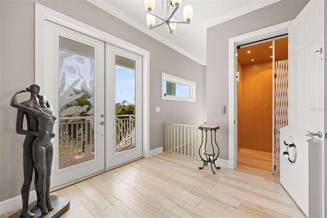15904 Redington Dr, Redington Beach, FL 33708 - doorway to outside with an inviting chandelier, wood finished floors, crown molding, and french doors