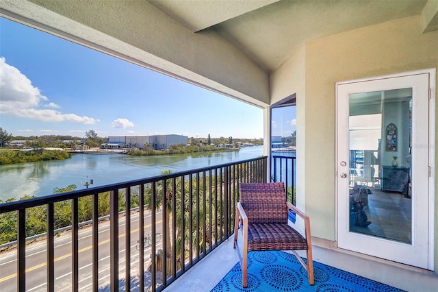 balcony featuring a water view