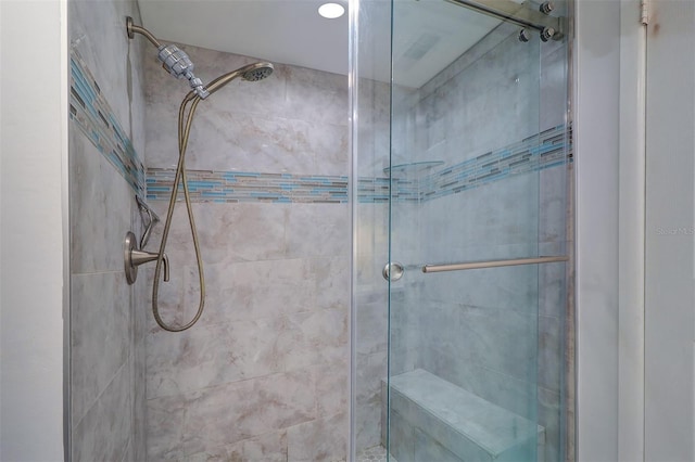 bathroom with a stall shower