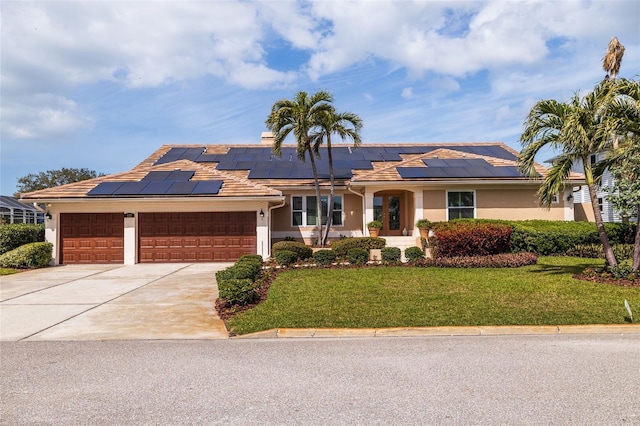 ranch-style house with driveway, an attached garage, a front yard, and stucco siding