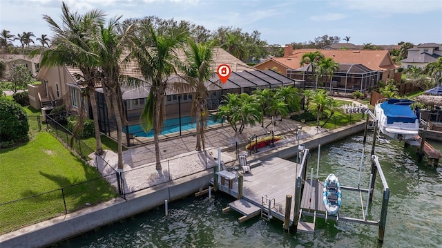 dock area with glass enclosure, boat lift, a community pool, and fence