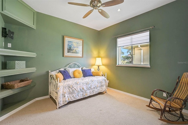 bedroom with baseboards, carpet floors, and ceiling fan