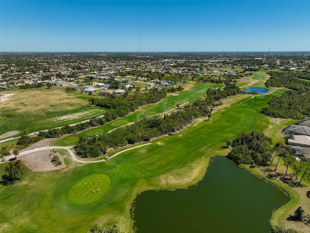 aerial view featuring a water view and view of golf course