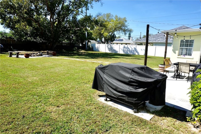 view of yard featuring a patio area and fence