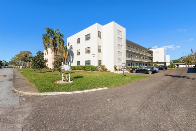 5969 Terrace Park Dr N Unit 203, Saint Petersburg, FL 33709 - view of property with uncovered parking