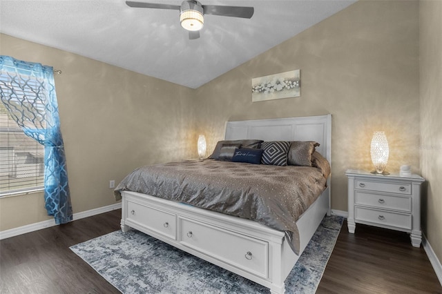 bedroom with lofted ceiling, a ceiling fan, baseboards, and wood finished floors