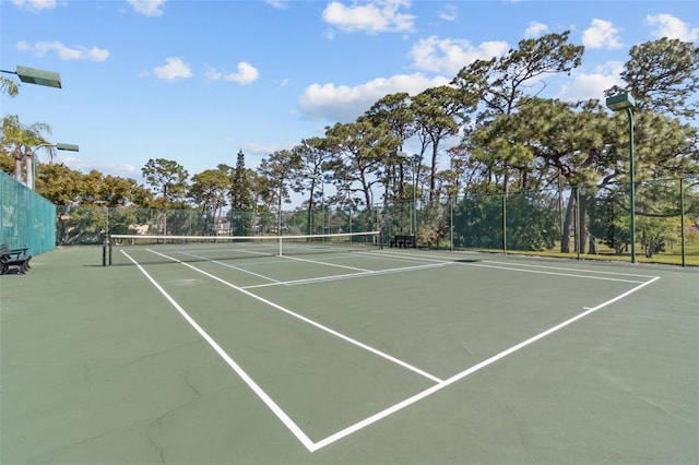 view of sport court featuring community basketball court and fence