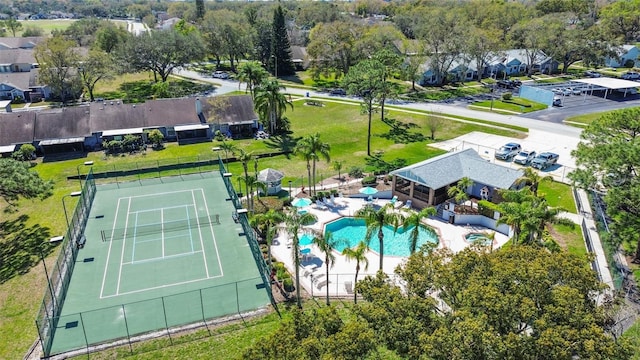 birds eye view of property with a residential view