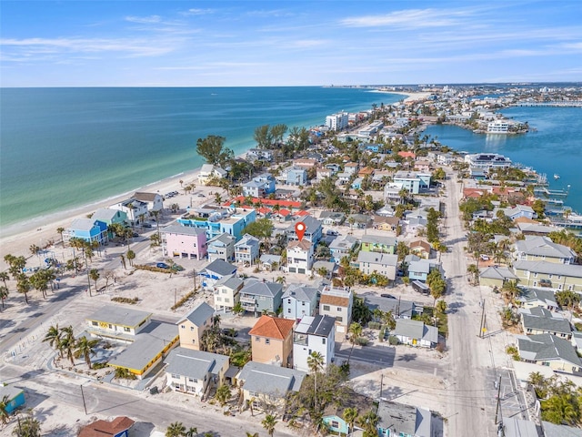 aerial view with a water view and a view of the beach