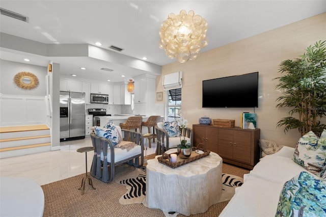 living area featuring recessed lighting, light tile patterned flooring, visible vents, and a notable chandelier