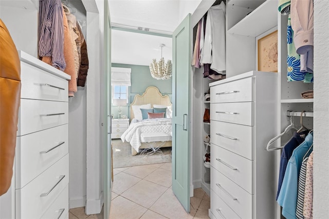 walk in closet featuring light tile patterned floors