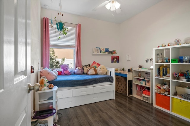 bedroom with a ceiling fan and wood finished floors