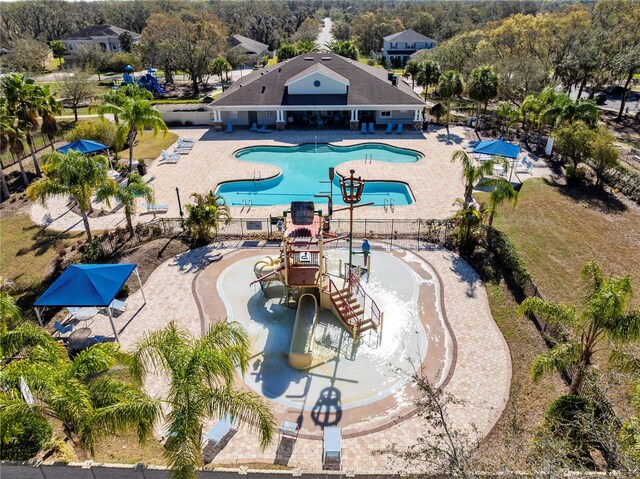 view of swimming pool featuring a patio area