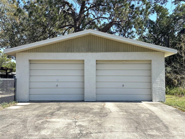 detached garage with fence