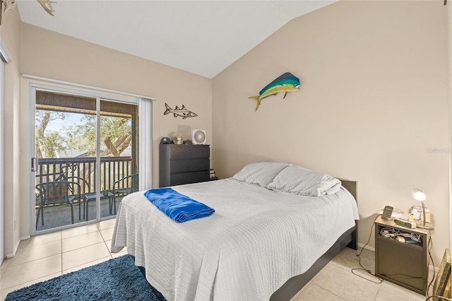 tiled bedroom with lofted ceiling, baseboards, and access to exterior