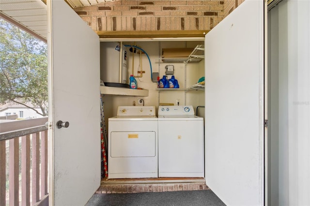 laundry area featuring laundry area and washer and clothes dryer