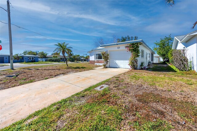 479 80th Way, St Pete Beach, FL 33706 - single story home featuring a garage and driveway
