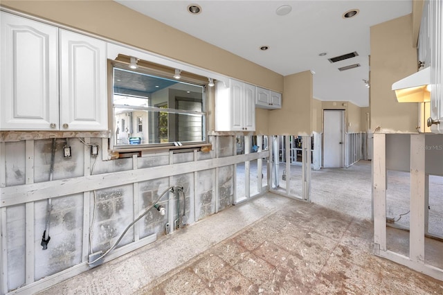479 80th Way, St Pete Beach, FL 33706 - kitchen featuring white cabinetry