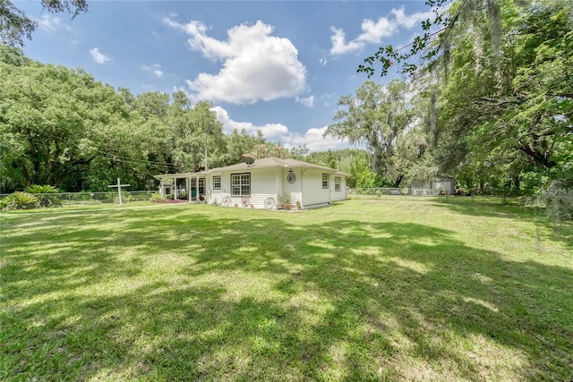 view of yard with a fenced backyard