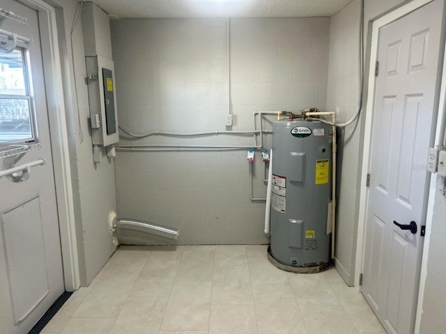 utility room with electric panel and electric water heater