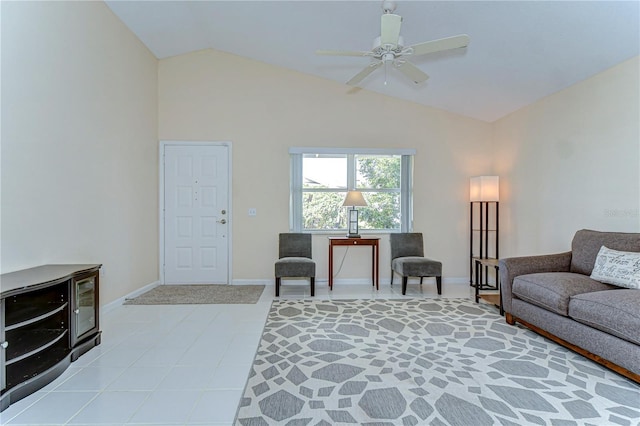 living room featuring ceiling fan, high vaulted ceiling, and baseboards