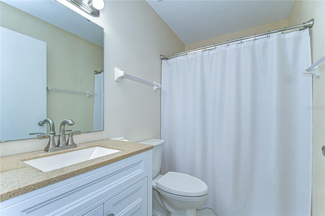 full bath with vanity and toilet