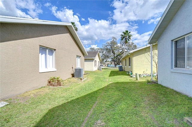 view of yard featuring central AC unit