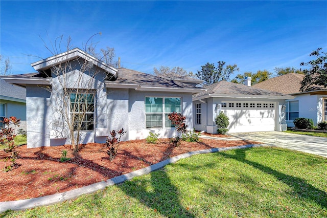 single story home with concrete driveway, stucco siding, roof with shingles, an attached garage, and a front yard