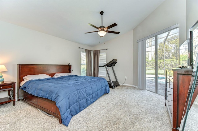 carpeted bedroom with access to outside, multiple windows, lofted ceiling, and baseboards