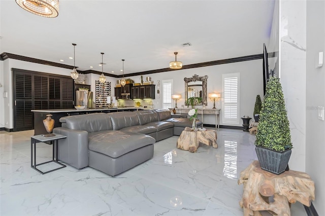 living area featuring marble finish floor, ornamental molding, visible vents, and recessed lighting