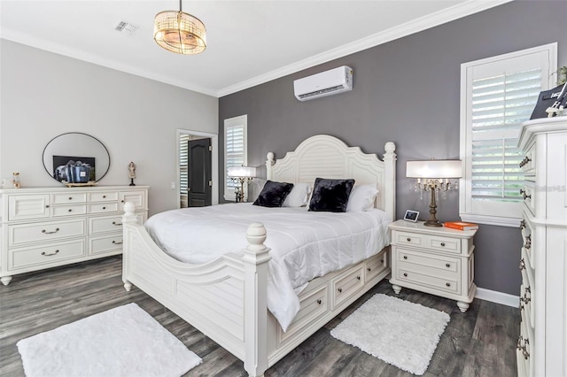 bedroom featuring visible vents, ornamental molding, dark wood-type flooring, a wall mounted air conditioner, and baseboards