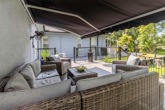 balcony featuring an outdoor living space