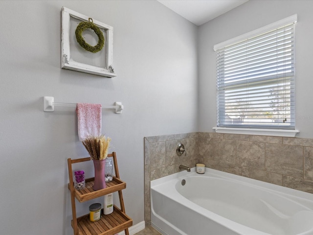 full bath with a garden tub