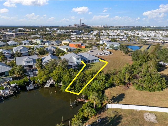 aerial view featuring a water view and a residential view