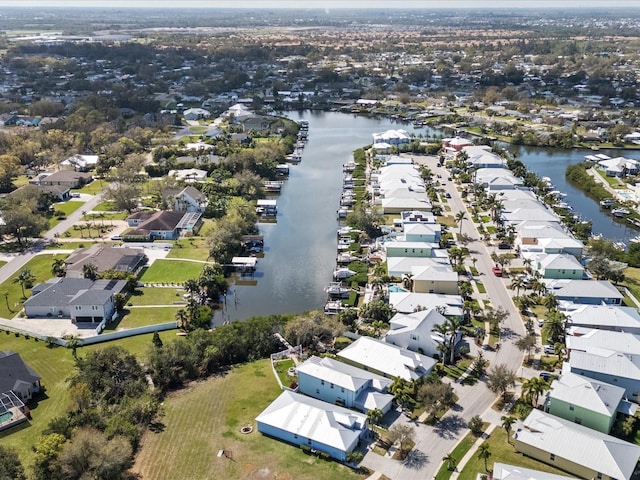 aerial view featuring a water view and a residential view