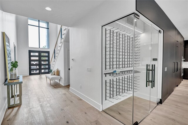 5017 W Dickens Ave, Tampa, FL 33629 - wine room with light wood-style floors, baseboards, and recessed lighting