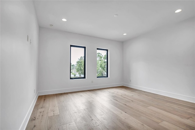 5017 W Dickens Ave, Tampa, FL 33629 - unfurnished room featuring light wood-style flooring, recessed lighting, and baseboards