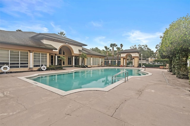 view of pool with a patio area and a fenced in pool