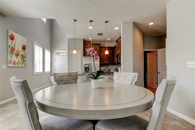 dining room featuring recessed lighting, visible vents, and baseboards