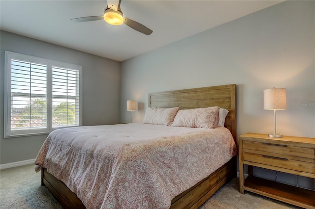 bedroom featuring carpet, ceiling fan, and baseboards