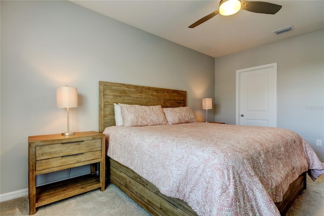 bedroom with carpet, visible vents, ceiling fan, and baseboards