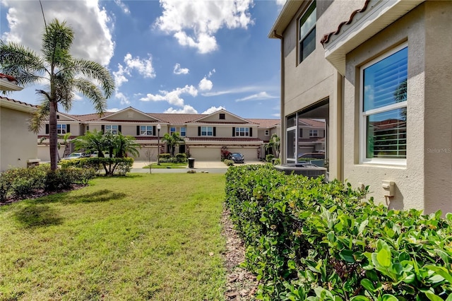 view of yard featuring a residential view