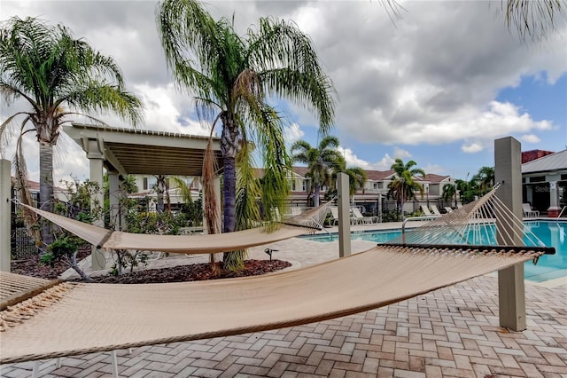 community pool with a patio