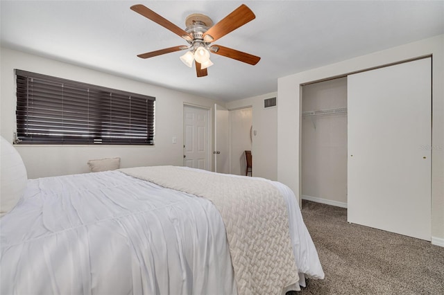 carpeted bedroom featuring visible vents, a ceiling fan, and baseboards