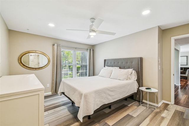 bedroom featuring recessed lighting, baseboards, light wood-style floors, and a ceiling fan