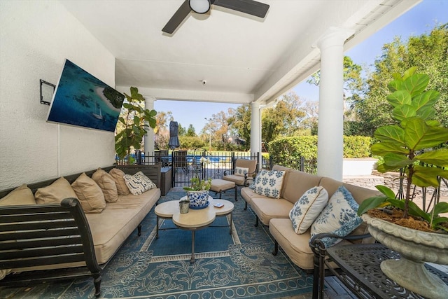 view of patio featuring an outdoor living space and a ceiling fan