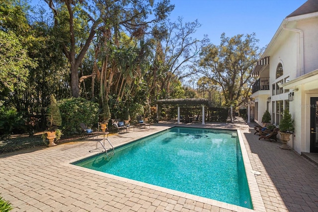 pool featuring a patio area