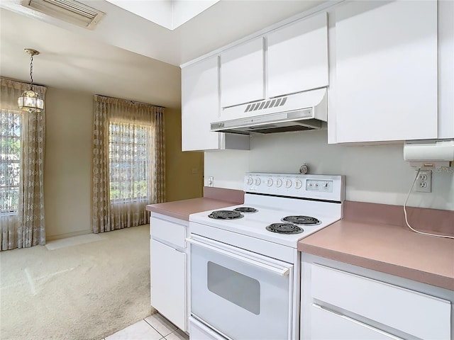 kitchen featuring under cabinet range hood, white cabinets, white electric range, and light colored carpet