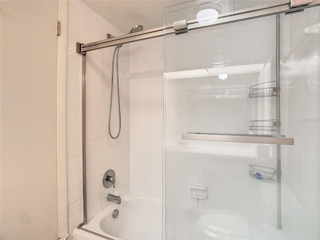 bathroom featuring enclosed tub / shower combo