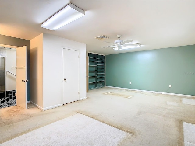 carpeted bedroom with baseboards, visible vents, and ceiling fan